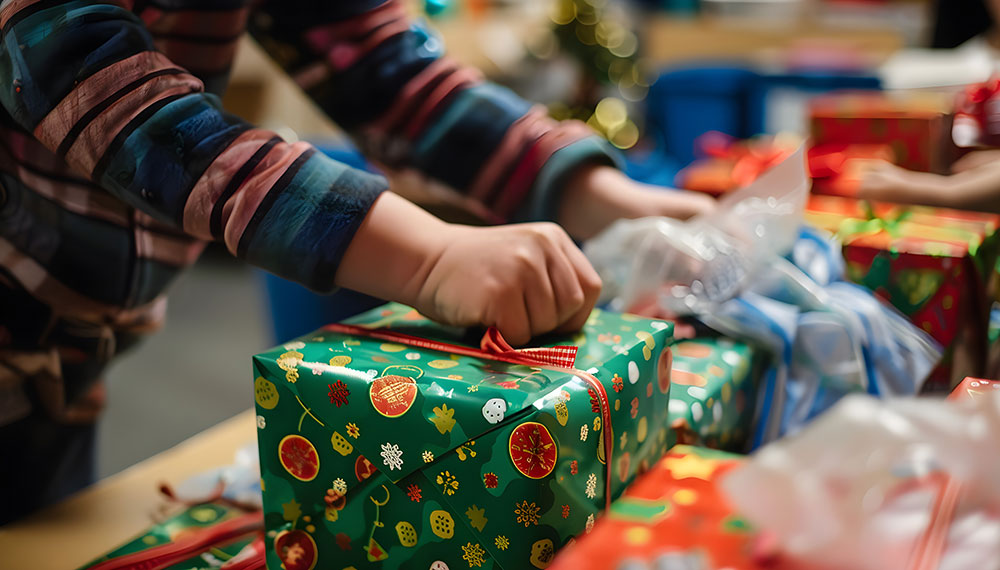 Person wrapping gifts